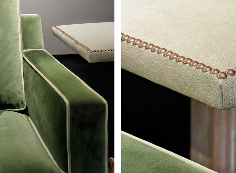 detalla del brazo del sofá de terciopelo verde con vivos en tono beige
