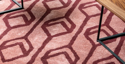 alfombra geometrica personalizada tonos rosas con cubos enlazados 